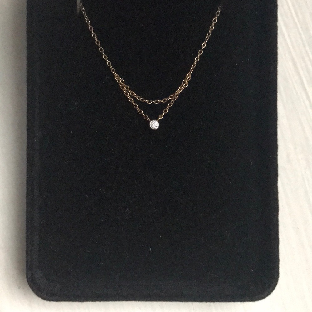 “Chained to my heart necklace, yellow gold”